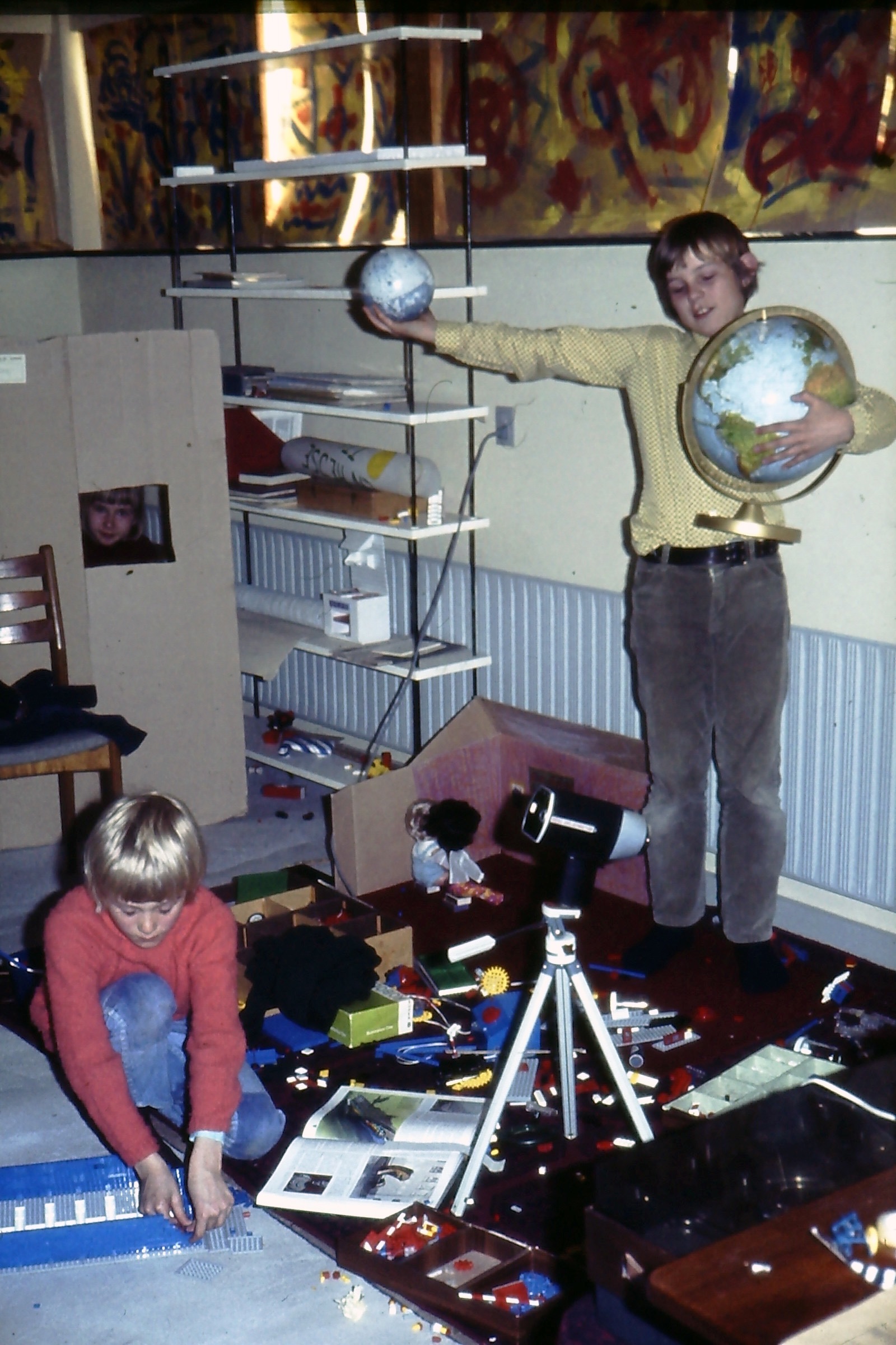 Lars playing with Moon and Earth while Henrik is building the air craft carrier